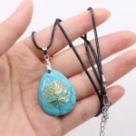 bijou arbre de vie en turquoise bleu chakras