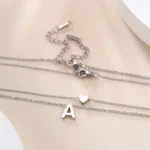 pendentif coeur et lettre en argent