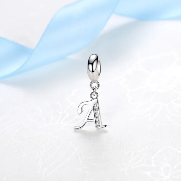 Pendentif lettre initial original en argent